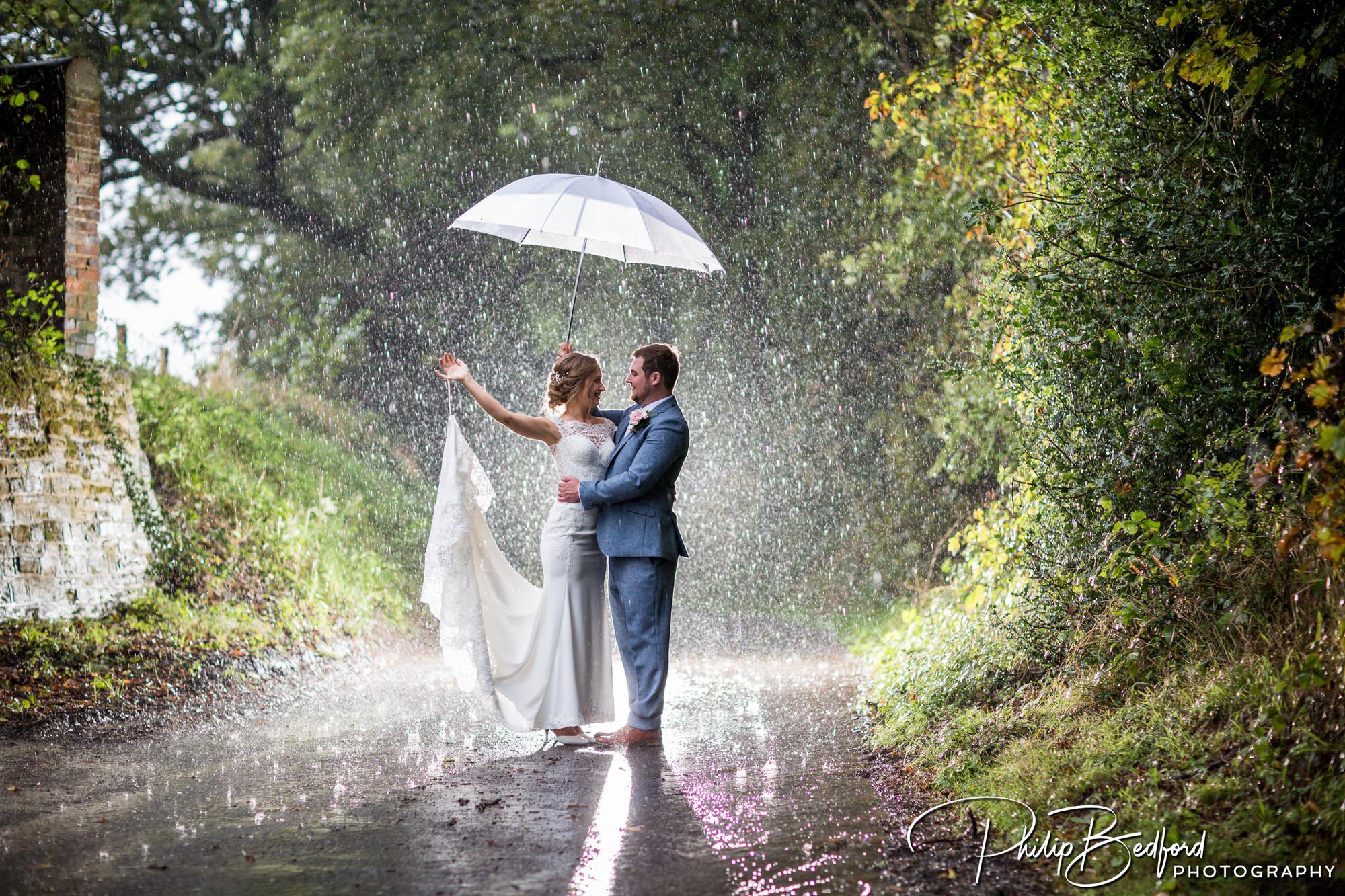 Fitzleroi Barn Autumn Wedding: Emma & Michael in the rain